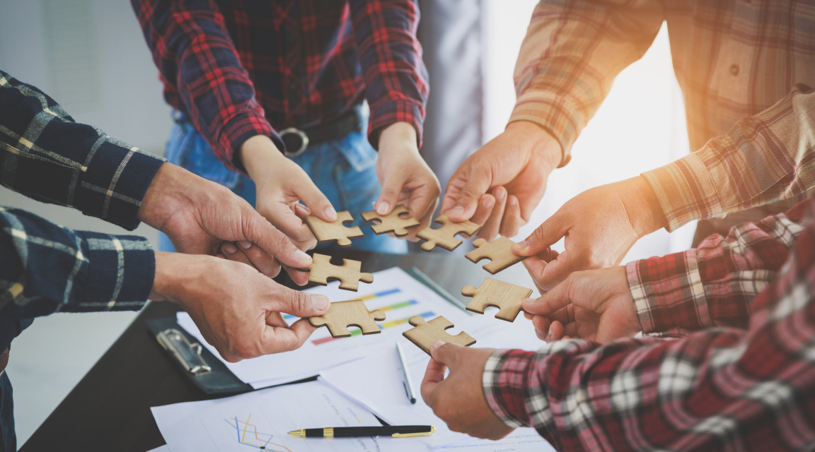 group-business-people-assemble-jigsaw-puzzles-concepts-cooperation-teamwork.jpg